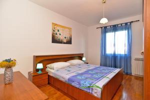 Posteľ alebo postele v izbe v ubytovaní Apartment Prostin 1168