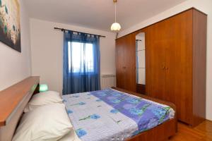 Posteľ alebo postele v izbe v ubytovaní Apartment Prostin 1168