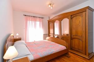 Posteľ alebo postele v izbe v ubytovaní Apartment Prostin 1168
