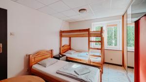 Posteľ alebo postele v izbe v ubytovaní Hostel Filip
