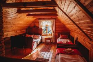 Posteľ alebo postele v izbe v ubytovaní Skansen Bicz Resort