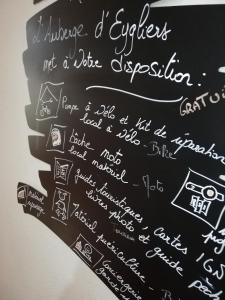 a chalkboard with equations on it with writing on it at L'Auberge d'Eygliers in Eygliers