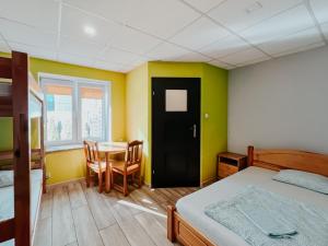 Posteľ alebo postele v izbe v ubytovaní Hostel Filip