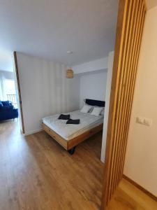 Posteľ alebo postele v izbe v ubytovaní LEOmare + 27 fotografií