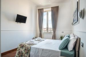 Posteľ alebo postele v izbe v ubytovaní Your Home in Florence next to the central train station