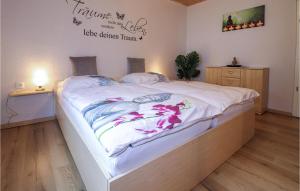 Voodi või voodid majutusasutuse Ruhige Ferienwohnung Loich toas