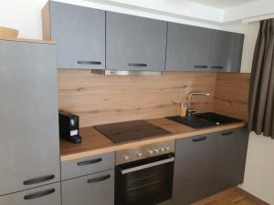 Kuchyňa alebo kuchynka v ubytovaní Bachschneider Apartments - by myNests