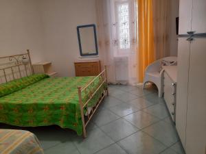 Postel nebo postele na pokoji v ubytování Casa Vacanza Villa Lesto + 28 fotografií