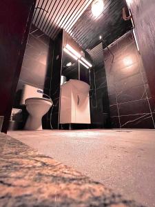 a bathroom with two toilets in a room at DARTAD APARTMENT in Ohrid +7 photos