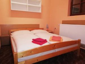 Postel nebo postele na pokoji v ubytování Pension Vladimír