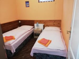 Postel nebo postele na pokoji v ubytování Pension Vladimír