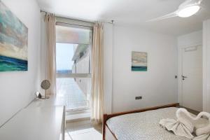 Posteľ alebo postele v izbe v ubytovaní Casa Médano 25 en el Médano