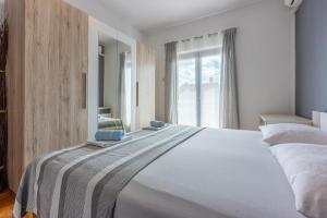 Postel nebo postele na pokoji v ubytování Apartment Suzy