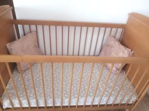 Postel nebo postele na pokoji v ubytování Lotus Apartman II