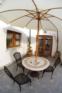 A patio or other outdoor area at Avlon House Bed and Breakfast