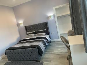 Postelja oz. postelje v sobi nastanitve Ibrox Argyll Inn