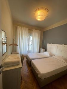 Posteľ alebo postele v izbe v ubytovaní Address Home I Colori Del Mare