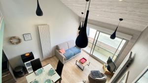 Telewizja i/lub zestaw kina domowego w obiekcie Appartement vue mer, Brigantine