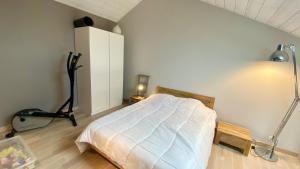 Łóżko lub łóżka w pokoju w obiekcie Appartement vue mer, Brigantine