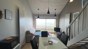 Część wypoczynkowa w obiekcie Appartement vue mer, Brigantine