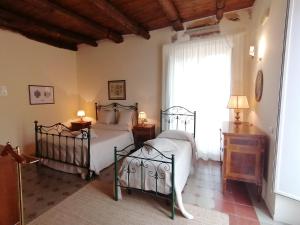 Postel nebo postele na pokoji v ubytování B&B Palazzo Lanza