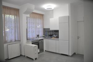 Kuchyňa alebo kuchynka v ubytovaní Casa Monì