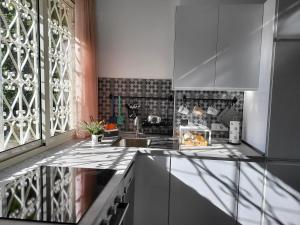 Kuchyňa alebo kuchynka v ubytovaní Casa Monì