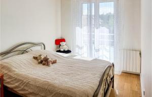 Katil atau katil-katil dalam bilik di Amazing Apartment In Triel-Sur-Seine