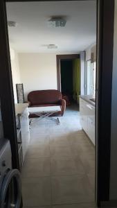 a view of a living room with a couch at Tranquillité B&B in Cuxac-dʼAude