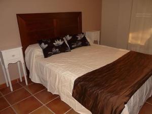 Posteľ alebo postele v izbe v ubytovaní Apartamentos en sierra de gata ALMA