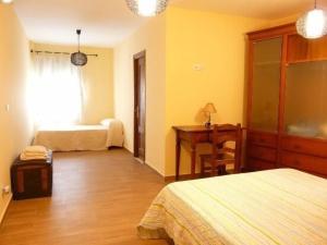 Posteľ alebo postele v izbe v ubytovaní Apartamentos en sierra de gata ALMA