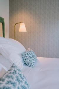 Postel nebo postele na pokoji v ubytování Villa Tri Men