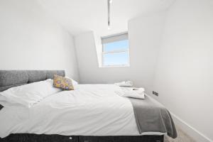 Katil atau katil-katil dalam bilik di Manhattan-style 2bed near Camden Free WiFi