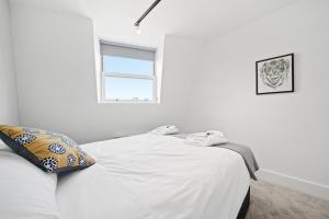 Katil atau katil-katil dalam bilik di Manhattan-style 2bed near Camden Free WiFi