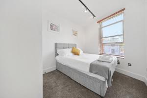 Katil atau katil-katil dalam bilik di Manhattan-style 2bed near Camden Free WiFi