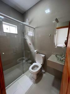 Een badkamer bij Pousada Rosália
