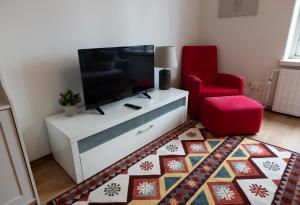 Televisor o centre d'entreteniment de 2ndhomes Central 1BR Apartment with Great Location by Kaisaniemi Park