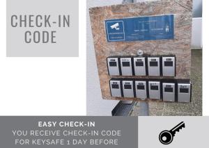 リンツにあるApartments at Winterhafenのチェックインコードとチェックインボックスの記号