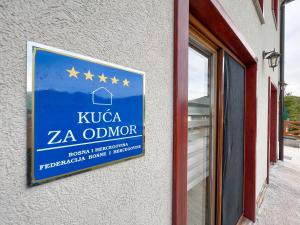 a sign on the side of a building with stars on it at Villa Sarajevo in Vareš