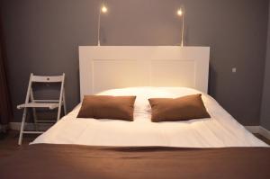 Кровать или кровати в номере Auberge du Lac