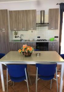 Kuchyň nebo kuchyňský kout v ubytování appartamento in villa splendente