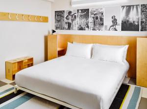 Ένα ή περισσότερα κρεβάτια σε δωμάτιο στο The Asbury Hotel