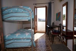 Postel nebo postele na pokoji v ubytování El mas allà