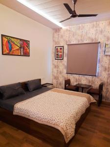 Postel nebo postele na pokoji v ubytování Stovehouse Inn