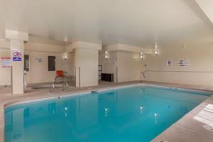 a large swimming pool in a building at Best Western Plus the Four Corners Inn in Farmington