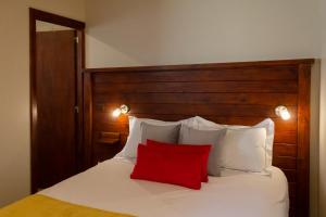 Ένα ή περισσότερα κρεβάτια σε δωμάτιο στο Aguila Mora Aparts