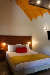 Ένα ή περισσότερα κρεβάτια σε δωμάτιο στο Aguila Mora Aparts