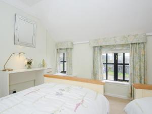 Postel nebo postele na pokoji v ubytování Church View Cottage