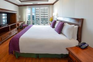En eller flere senge i et værelse på Hotel Casa Veranda Guatemala