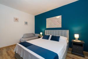 Postel nebo postele na pokoji v ubytování Apartment Mandre 4093a